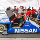 Illustration for article titled How Many Cars Can You Spot on This 360° Monterey Motorsports Reunion Paddock Ride?